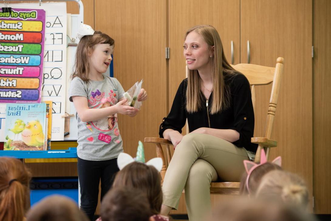 Student teacher in classroom with students