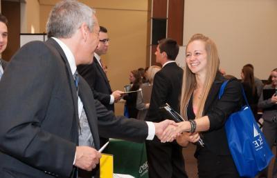 Student shaking hands